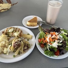 A dining hall serving multiple prepared meals.