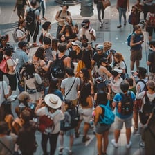 A crowded scene showing bustle and commotion