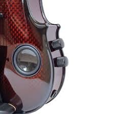 An electric violin connected by cable to an amplifier.