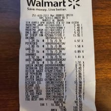 A shopping receipt showing a total cost.
