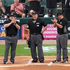 Baseball umpires officiating a game