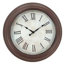 An antique clock face with the Roman numeral XII displayed at the top
