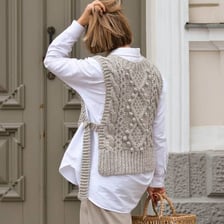 A sleeveless knitted sweater vest