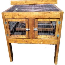 Enclosed animal pens on a farm.