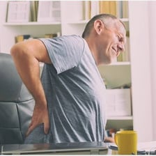 A person showing discomfort from an illness.