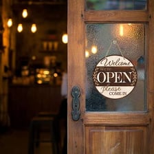 An open doorway welcoming visitors