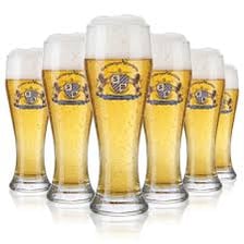 A coaster beneath a glass of German wheat beer
