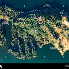Small island visible as a distinct landform from above.
