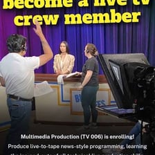 A television news crew broadcasting a live report.
