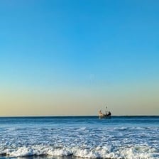 A broad expanse of sea reaching the horizon