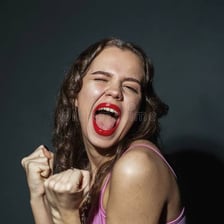 A person displaying a bold, confident attitude