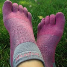 The reinforced toe section at the end of a sock.