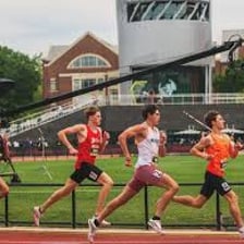An athlete performing intensely during a competitive event.