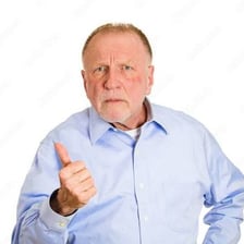 A person emphatically gesturing for someone to leave.