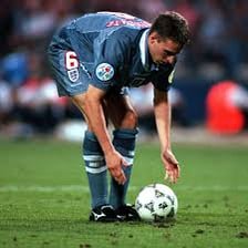 An athlete appearing to struggle during a competition.