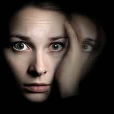 A person with a visibly gloomy or pessimistic expression