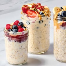 Oats soaking in liquid in a jar for an overnight breakfast