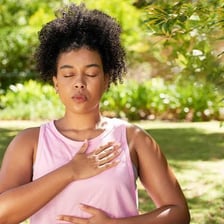 A person breathing in deeply.