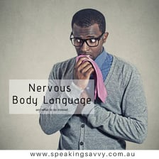 A person displaying tense, nervous body language.