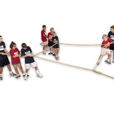 Two teams pulling opposite ends of a rope in a tug-of-war contest