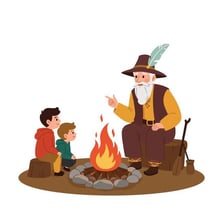 A person telling a story to listeners around a campfire.