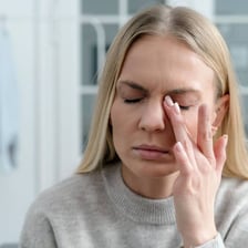 A person displaying a small nervous twitch around the eye