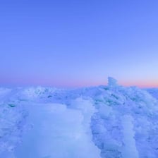A stark landscape covered in ice and frost.