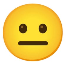 A person making a neutral, unimpressed expression.