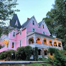 The exterior of a cozy lodging inn