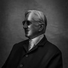 Musician and producer T Bone Burnett in a portrait.