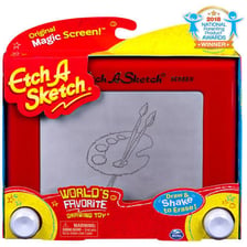A classic red Etch A Sketch drawing toy