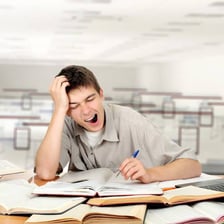 A bored person yawning during a dull activity.