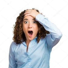A surprised person reacting with an astonished expression.
