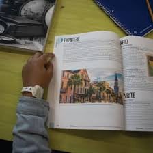 An open textbook showing a numbered instructional unit