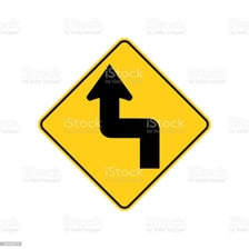 A road that changes direction through a series of curves.