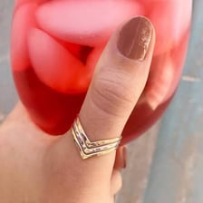 A ring worn on a person’s thumb