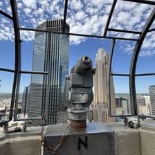 An object positioned on top of a tower