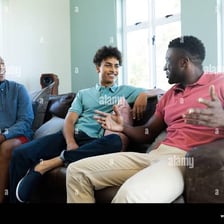 A group of male friends talking together
