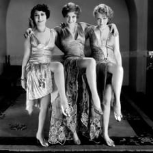A 1920s scene with flapper fashion and jazz-era dancing.