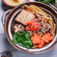 Sukiyaki hot pot containing thick udon noodles