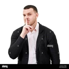 Person holding a finger to their lips in a be-quiet gesture