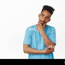 A person pausing thoughtfully with a hand near the chin.