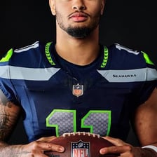 An American football player wearing a Seattle Seahawks uniform