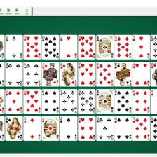 Four aces arranged beside a solitaire card layout