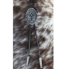 A bolo tie with a cord and prominent decorative clasp