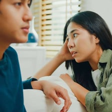 Two people in a situation where one asks why the other is not ready.