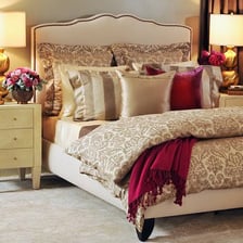 A bed in a bedroom.