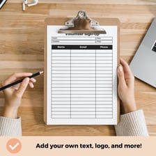 A person signing a form to volunteer for an activity.