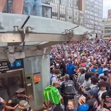A chaotic crowd scene showing disorder