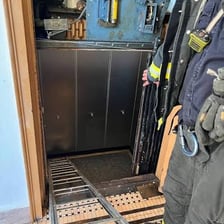 An elevator stopped between floors, illustrating the phrase “let you down”